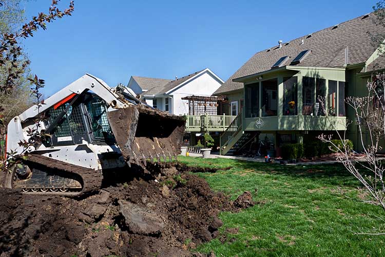 Excavation in residential backyard.