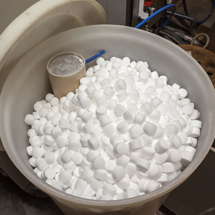 A container of salt blocks for a water softener.